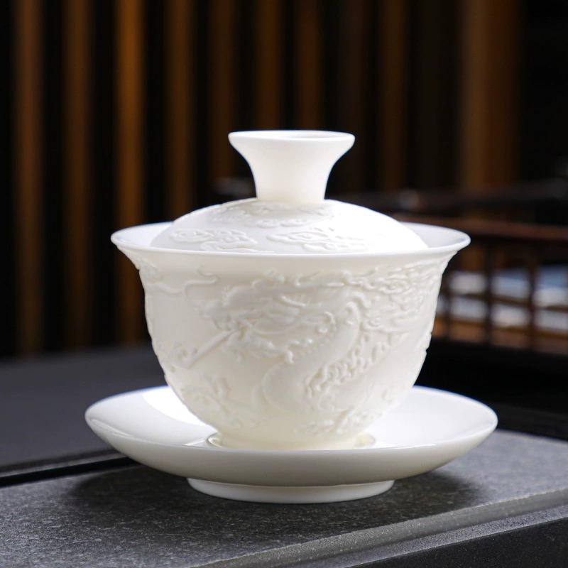 imgi_16_O1CN015D81rl1Q0CMWcuSNp_!!2450231913-0-cib.jpg_ Suet Jade White Porcelain Dragon & Phoenix Relief Tea Cup - Simple Design, Portable, Ideal for Business Gifting - Image 1